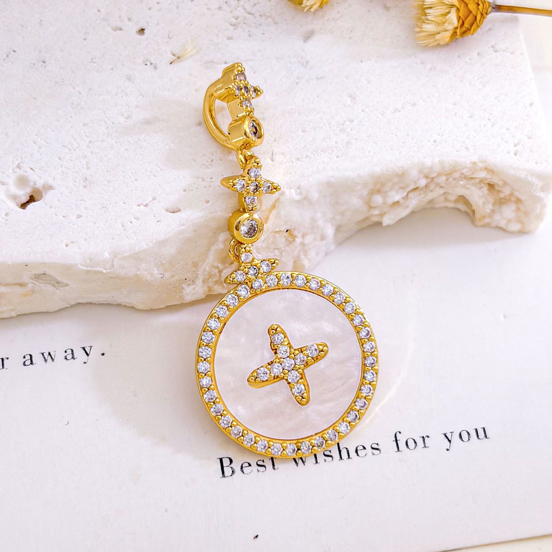 11:Xl1850 round star pendant gold