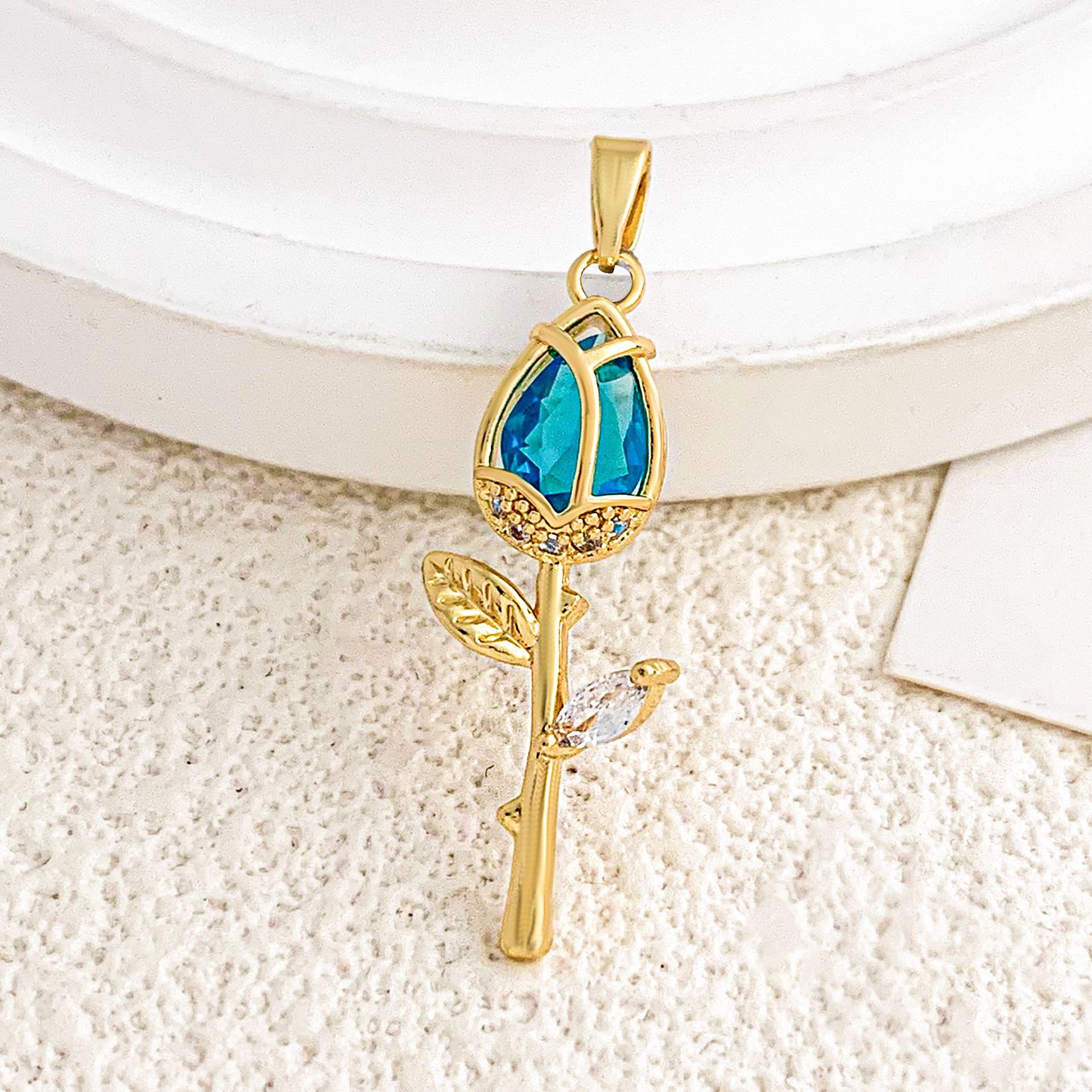 Xl2983 sea blue rose pendant gold