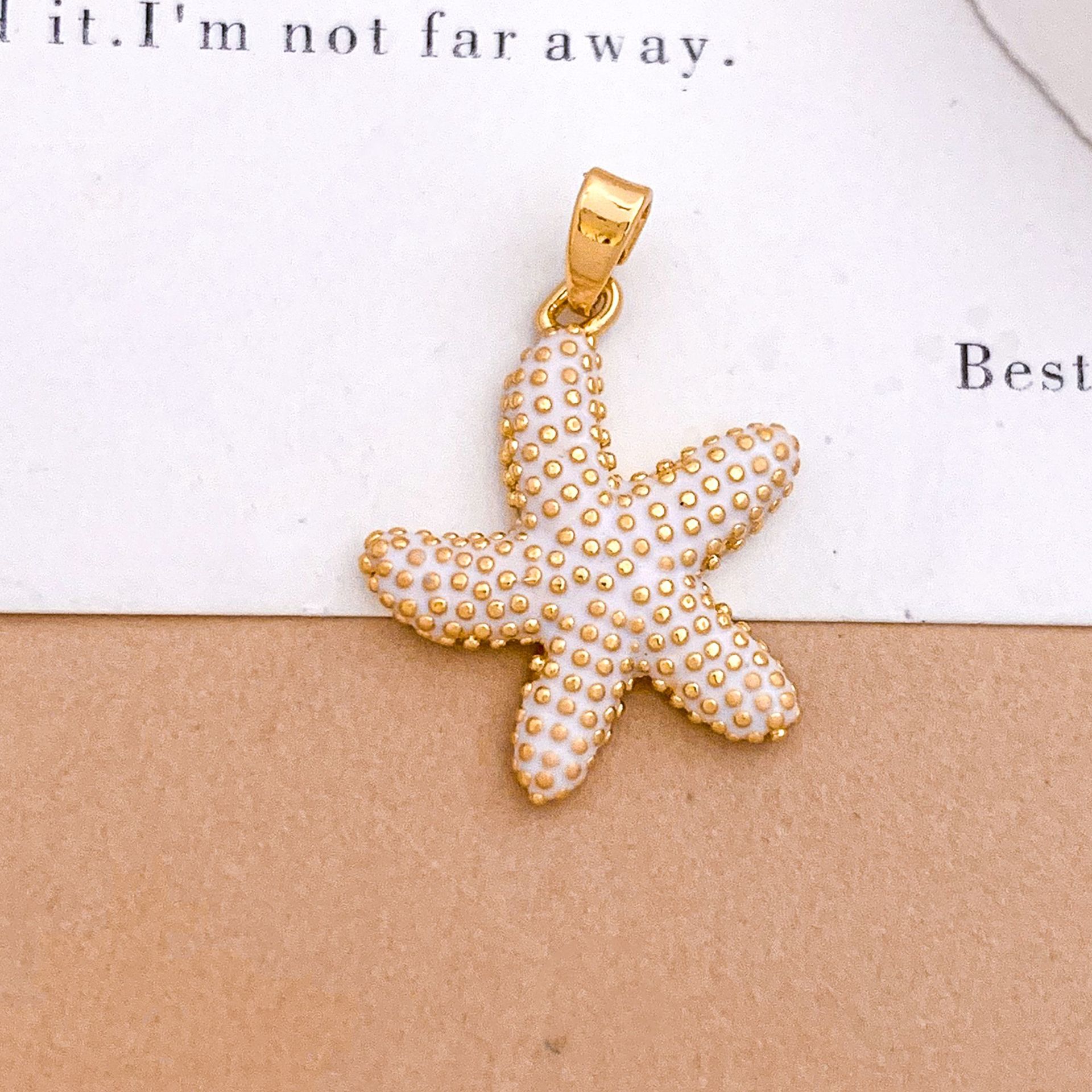 1:Xl4120 dancing starfish pendant gold white