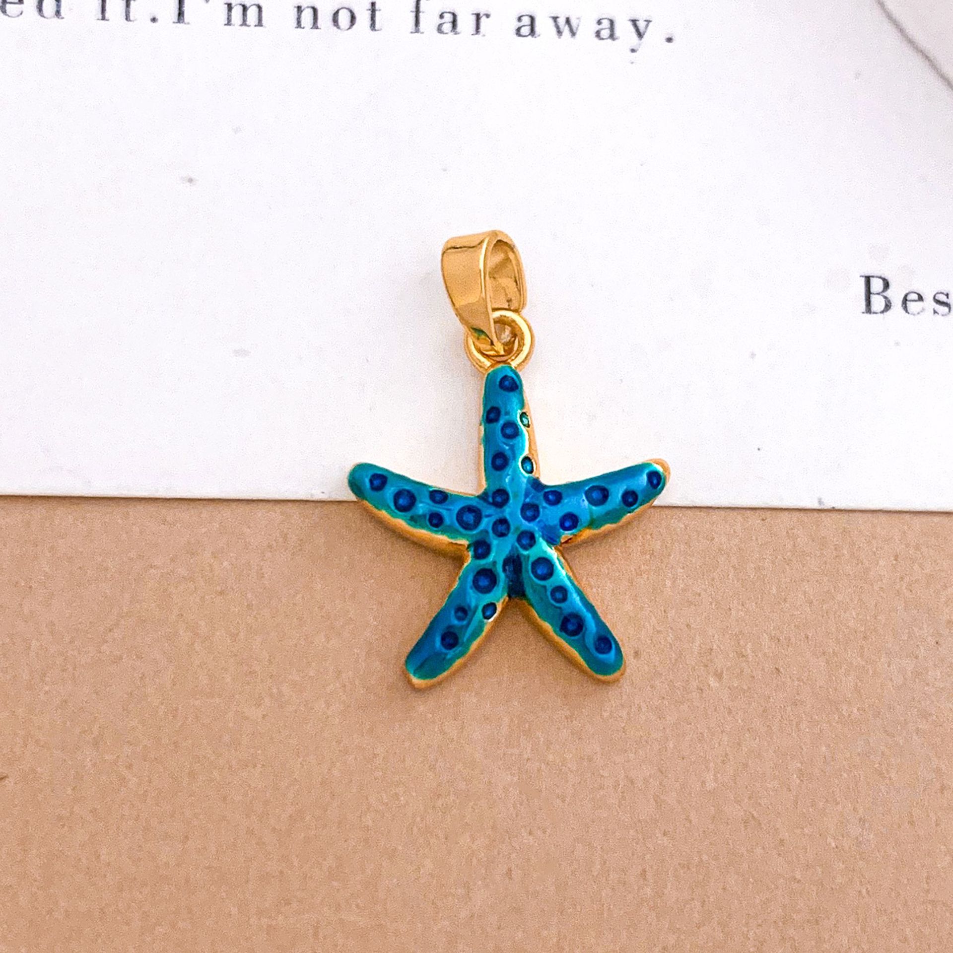 6:Xl4575 starfish pendant gold blue