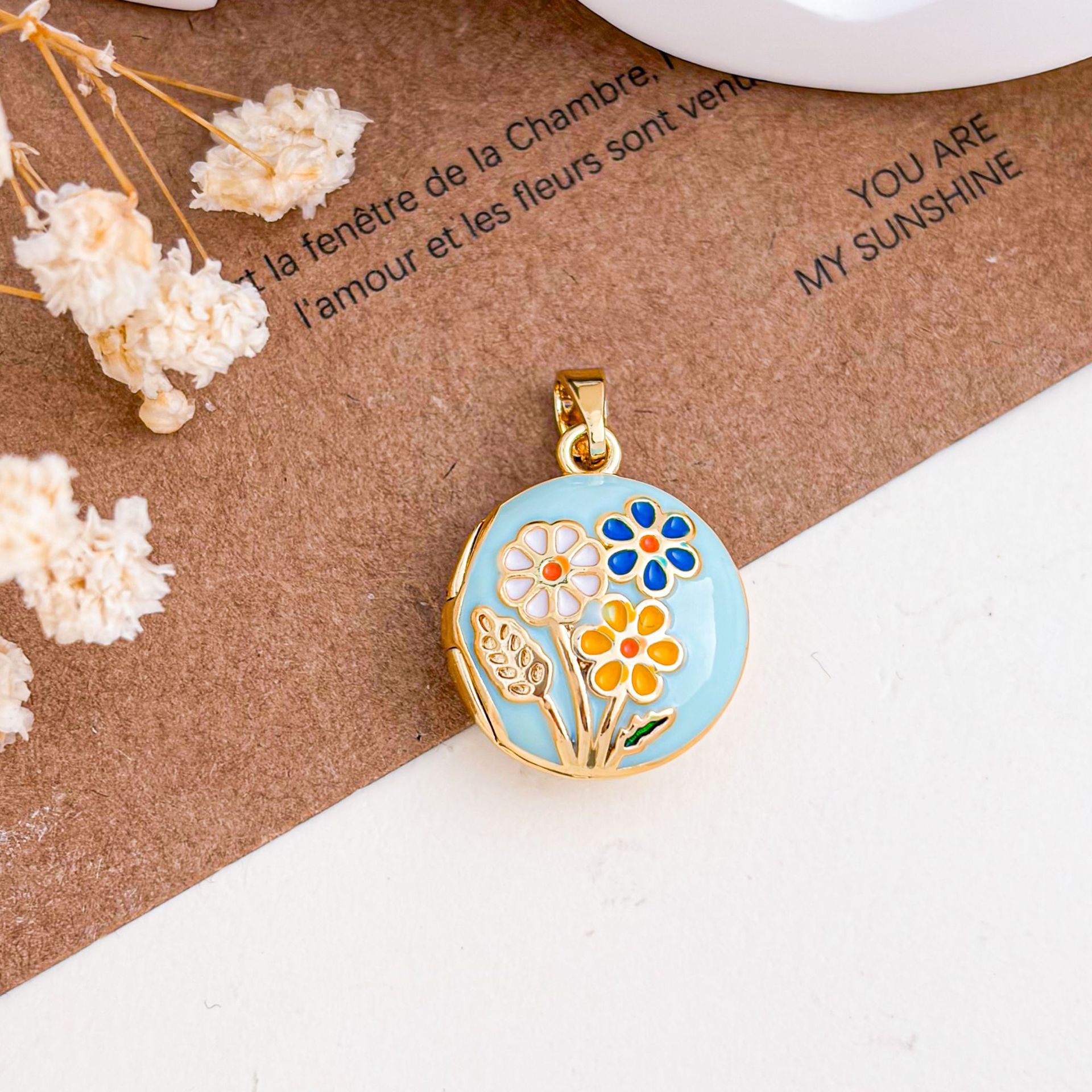 Xl5023 daisy photo clip pendant gold blue