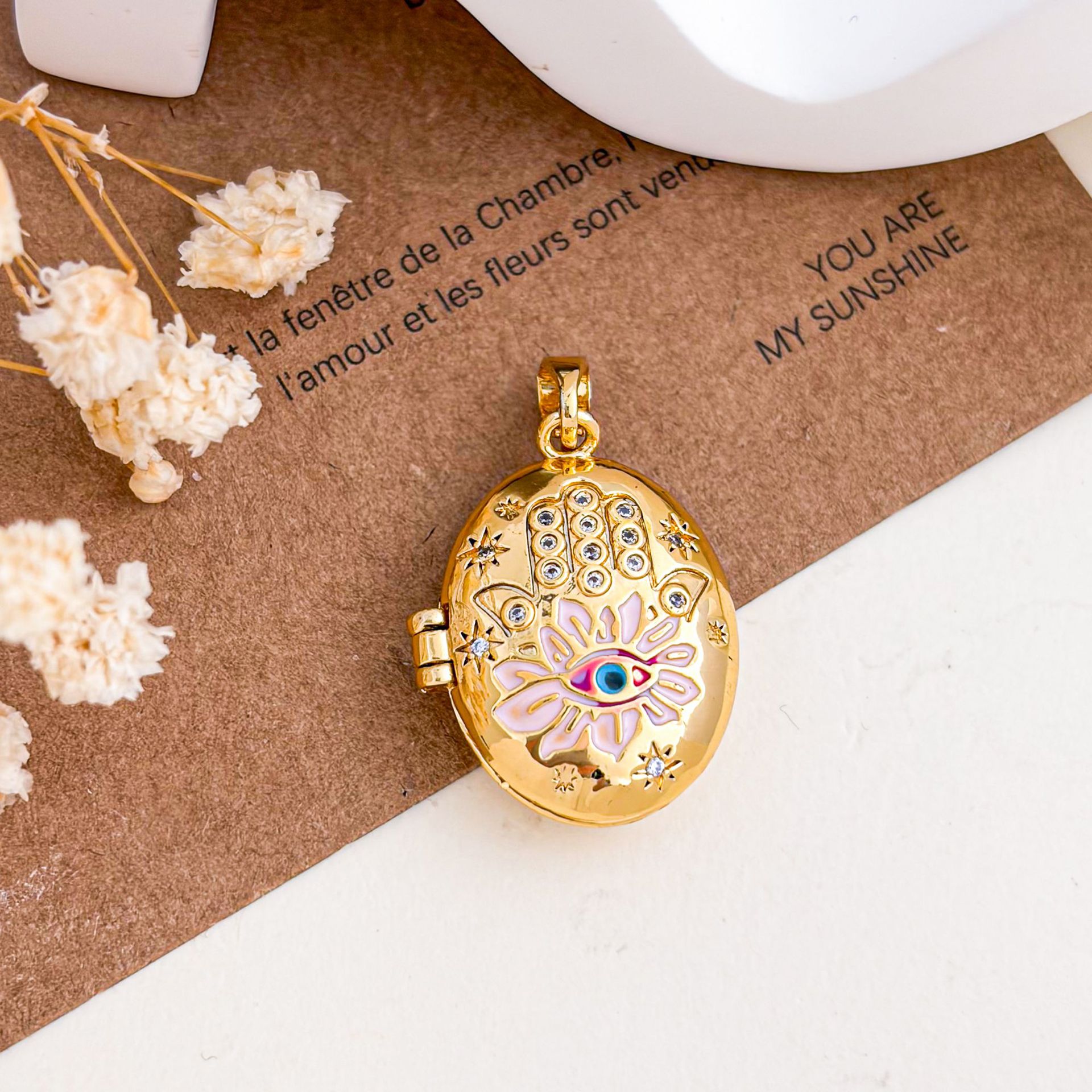 1:Xl5002 devil's eye photo clip pendant gold pink