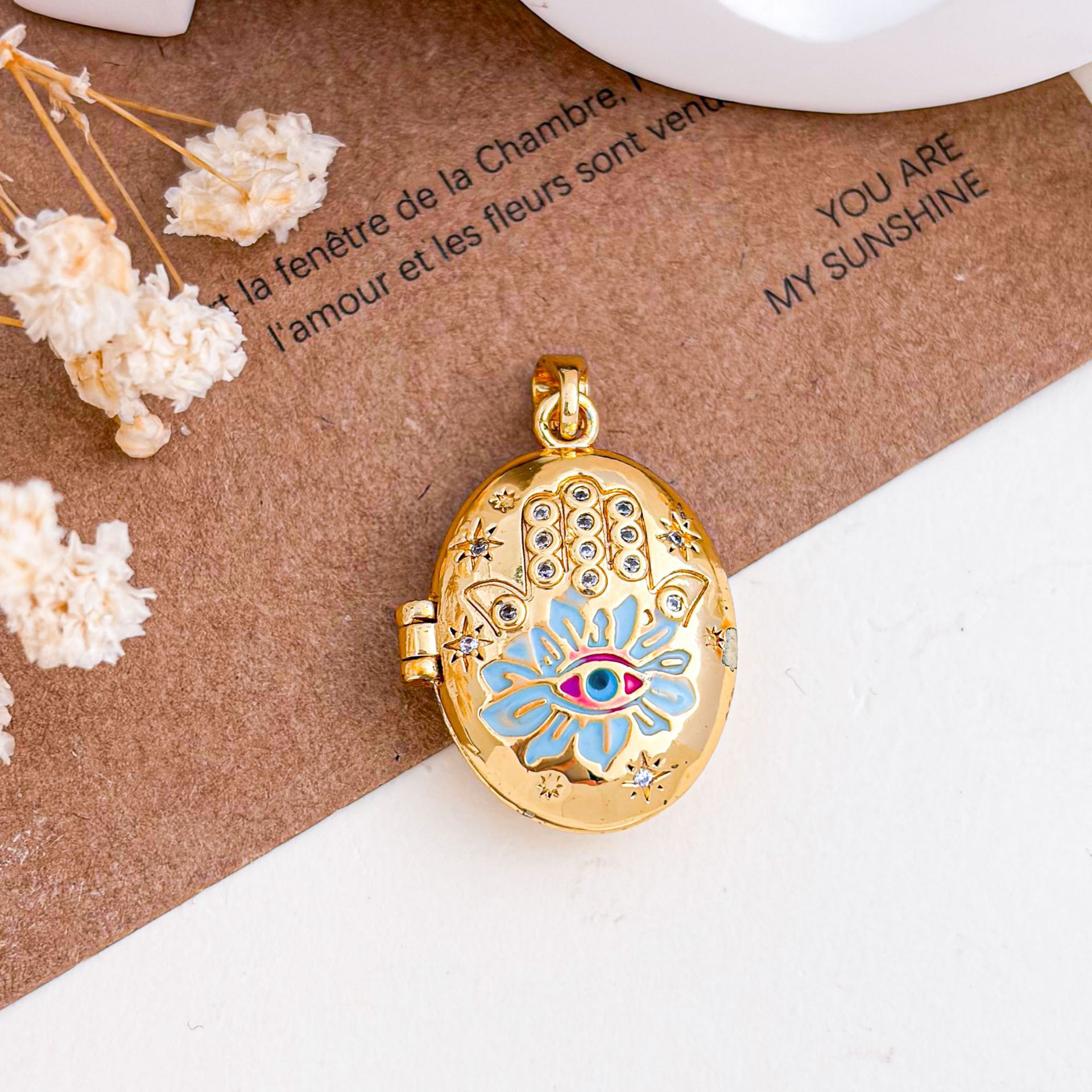 2:Xl5002 devil's eye photo clip pendant gold blue