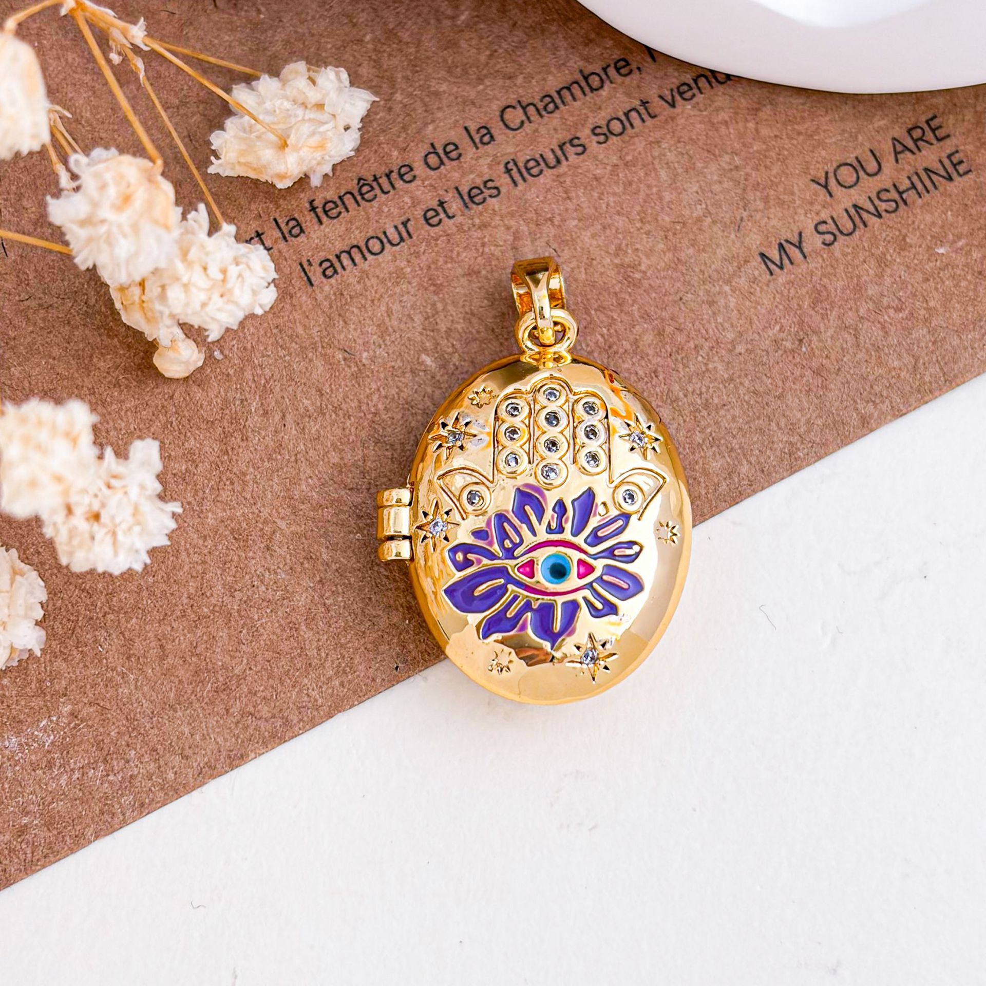 4:Xl5002 devil's eye photo clip pendant gold purple