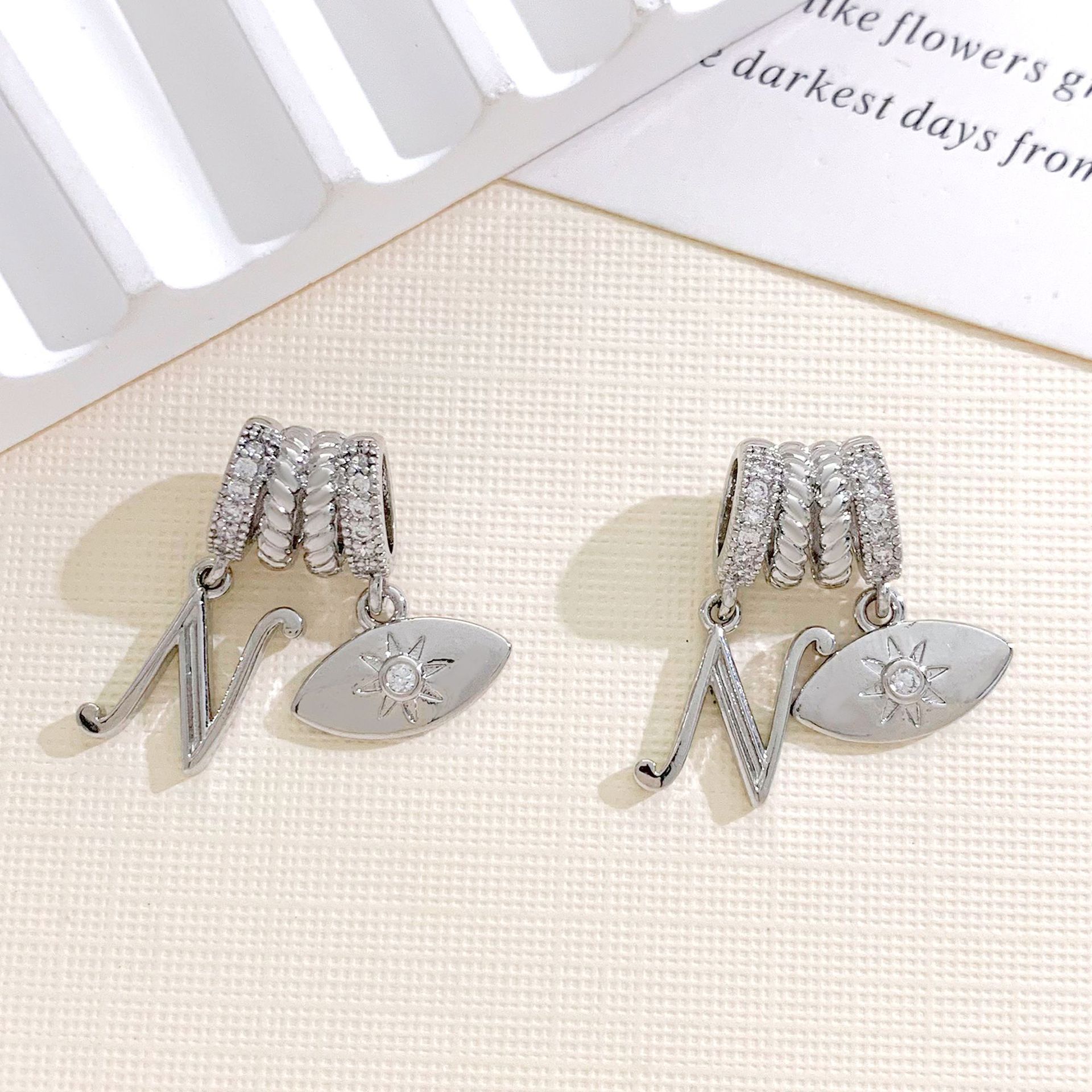 11:Xl4493 eye letter n combination pendant silver
