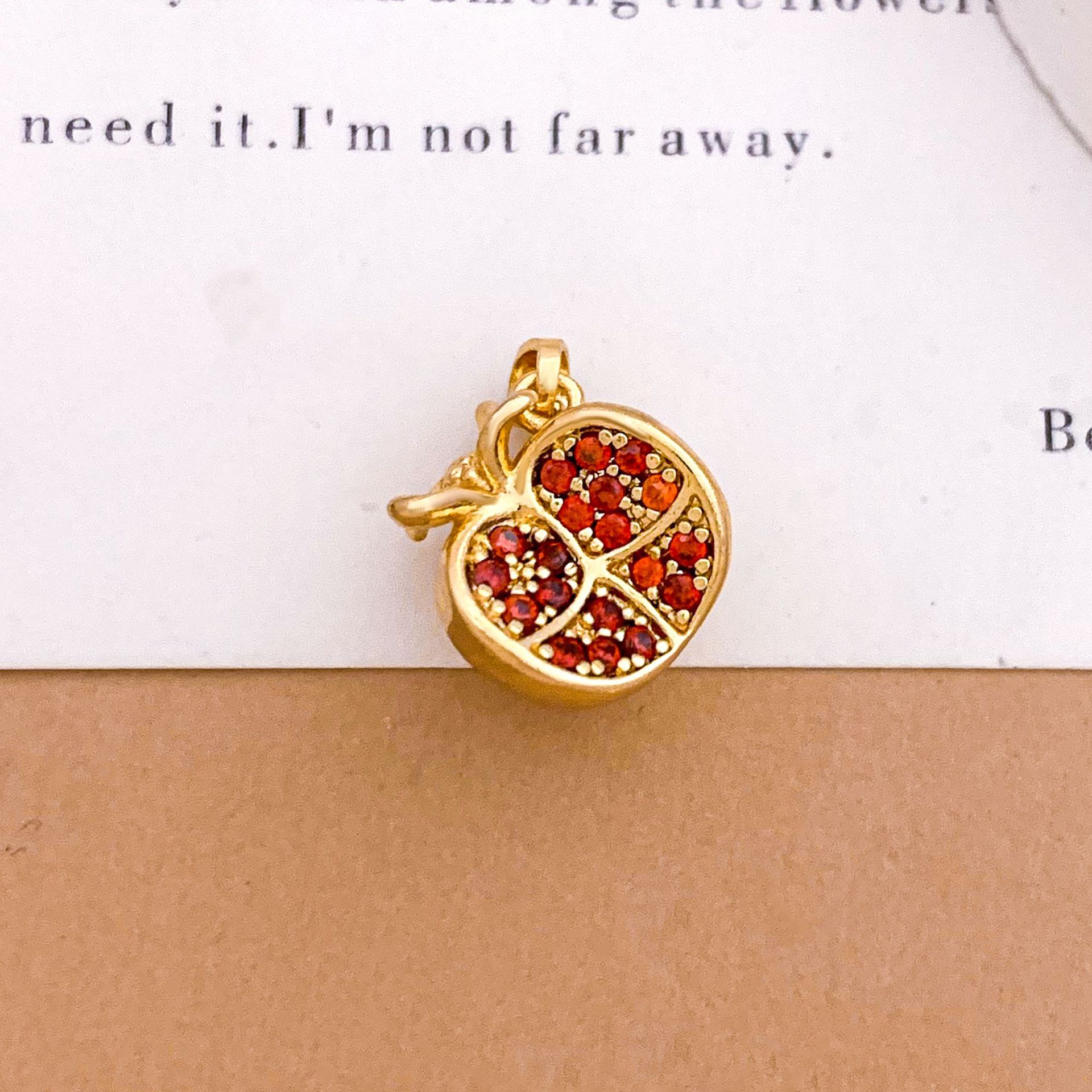 2:Xl5557 four-petal pomegranate pendant gold