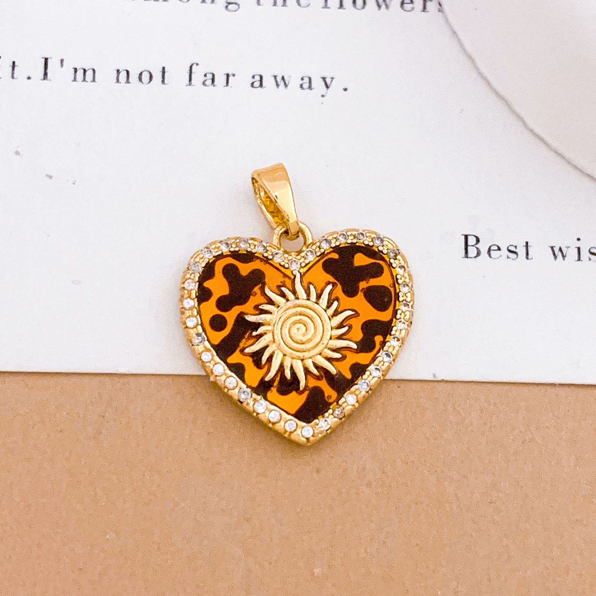 9:Xl5245 leopard print sun heart pendant gold