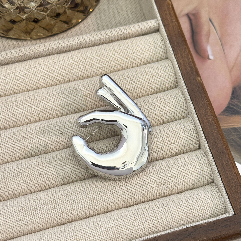 Glossy ok gesture brooch-large white k color
