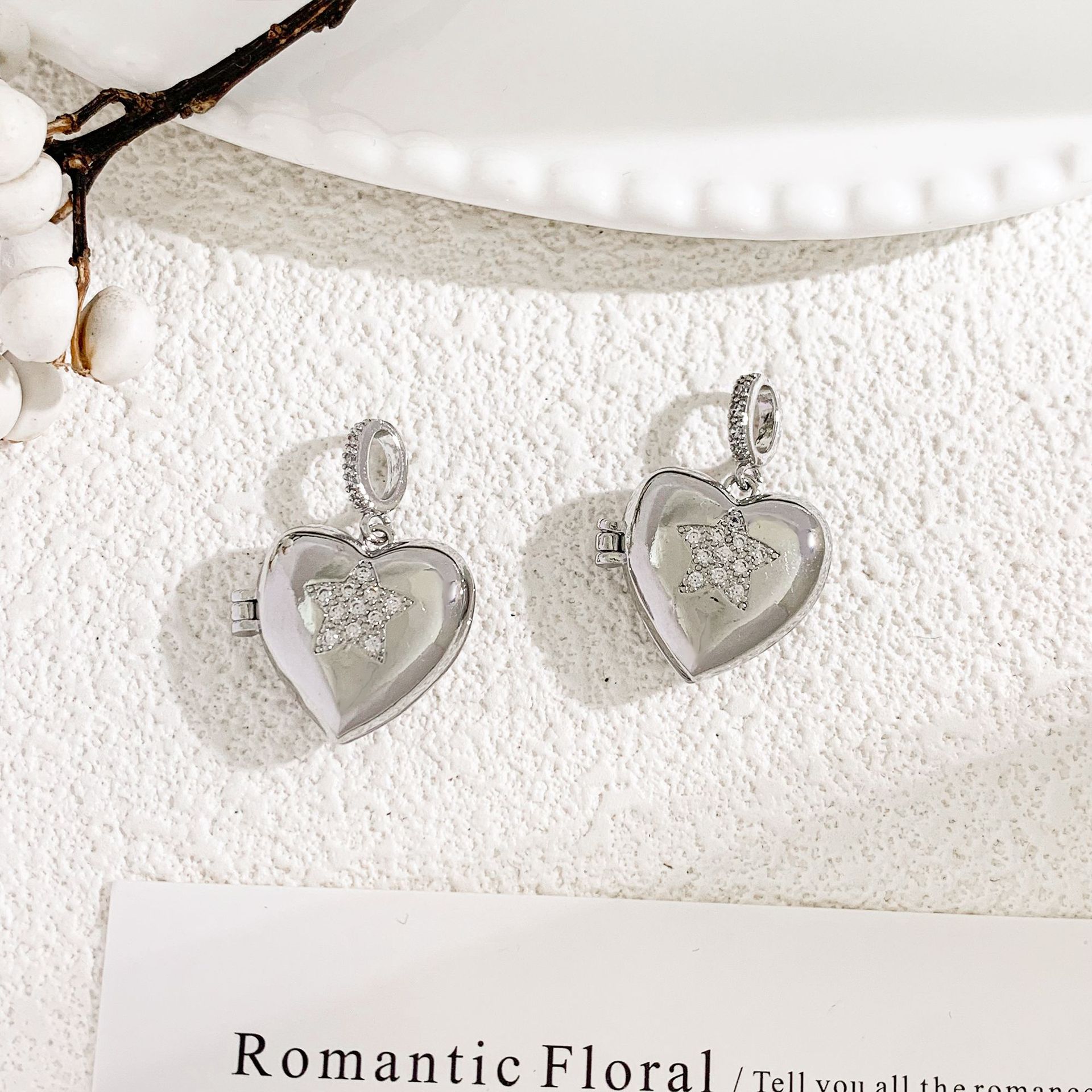 10:Xl4035 star open/closed pendant - silver