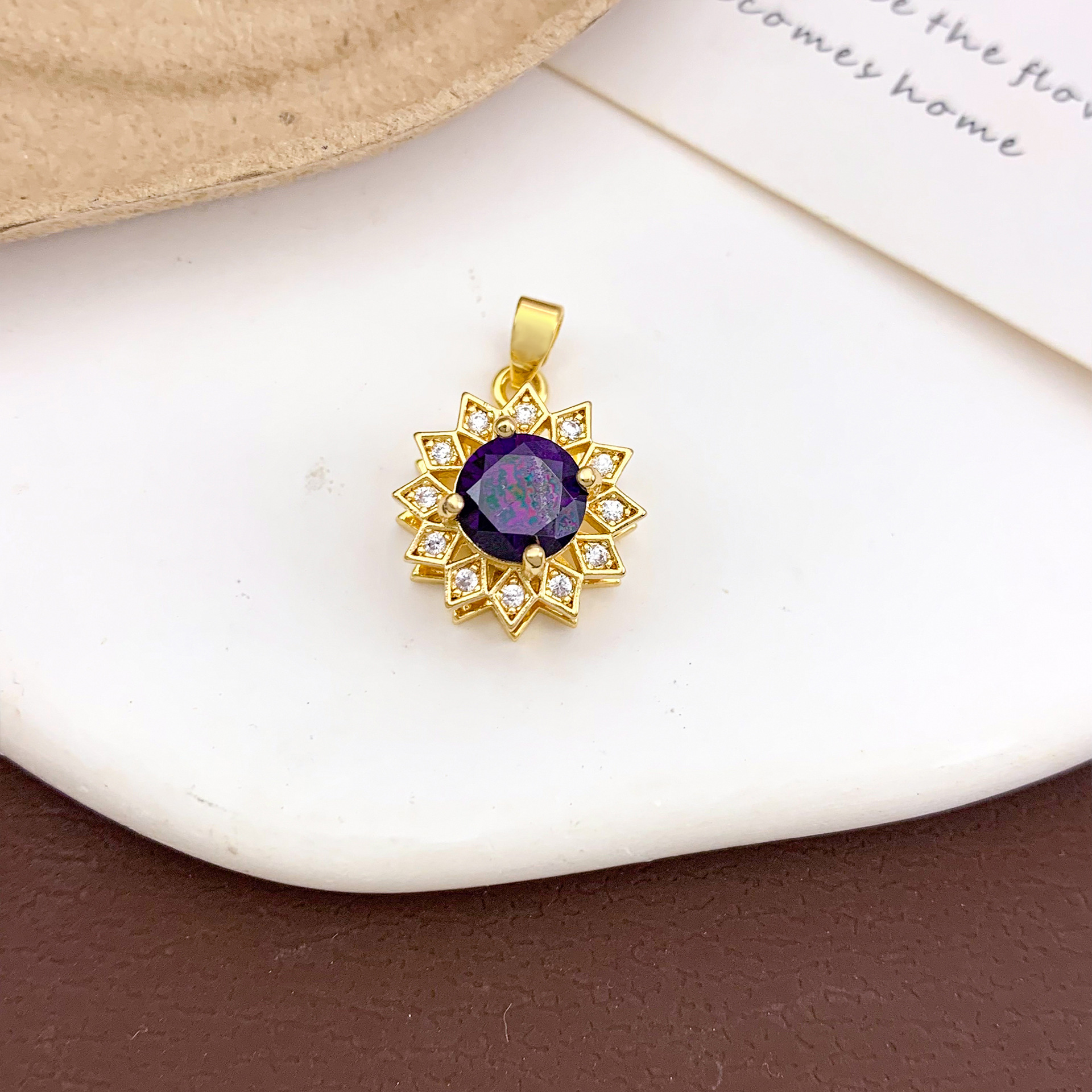 11:Xl912 rotating diamond pendant gold purple