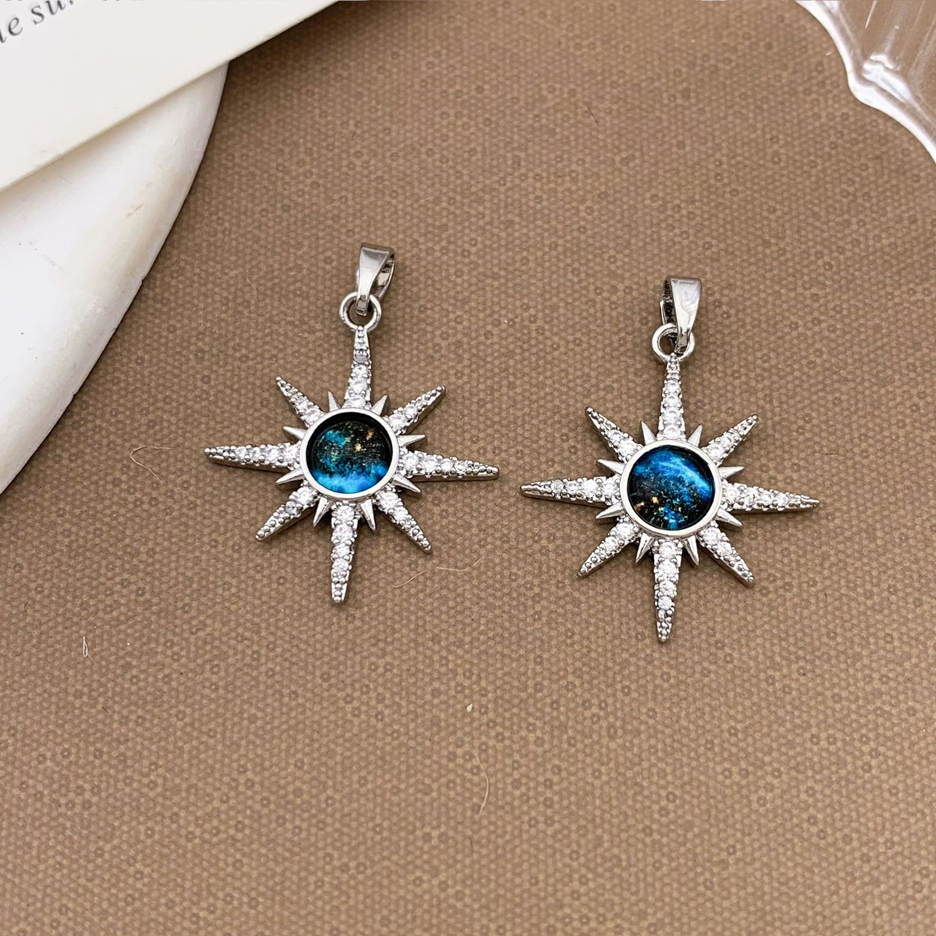 5:Xl1162 eight-pointed star planet pendant silver