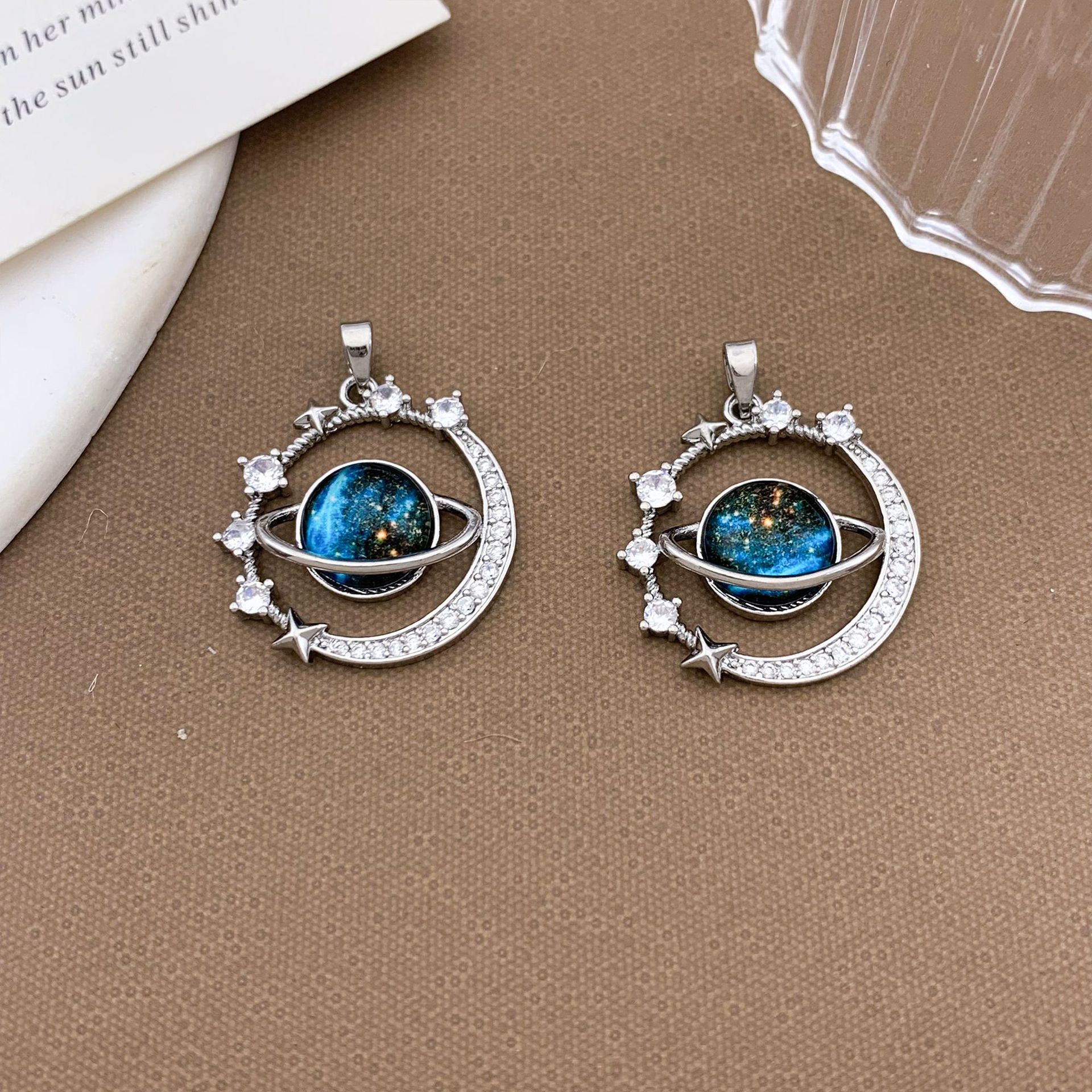 7:Xl1165 stars surrounding planet pendant silver large