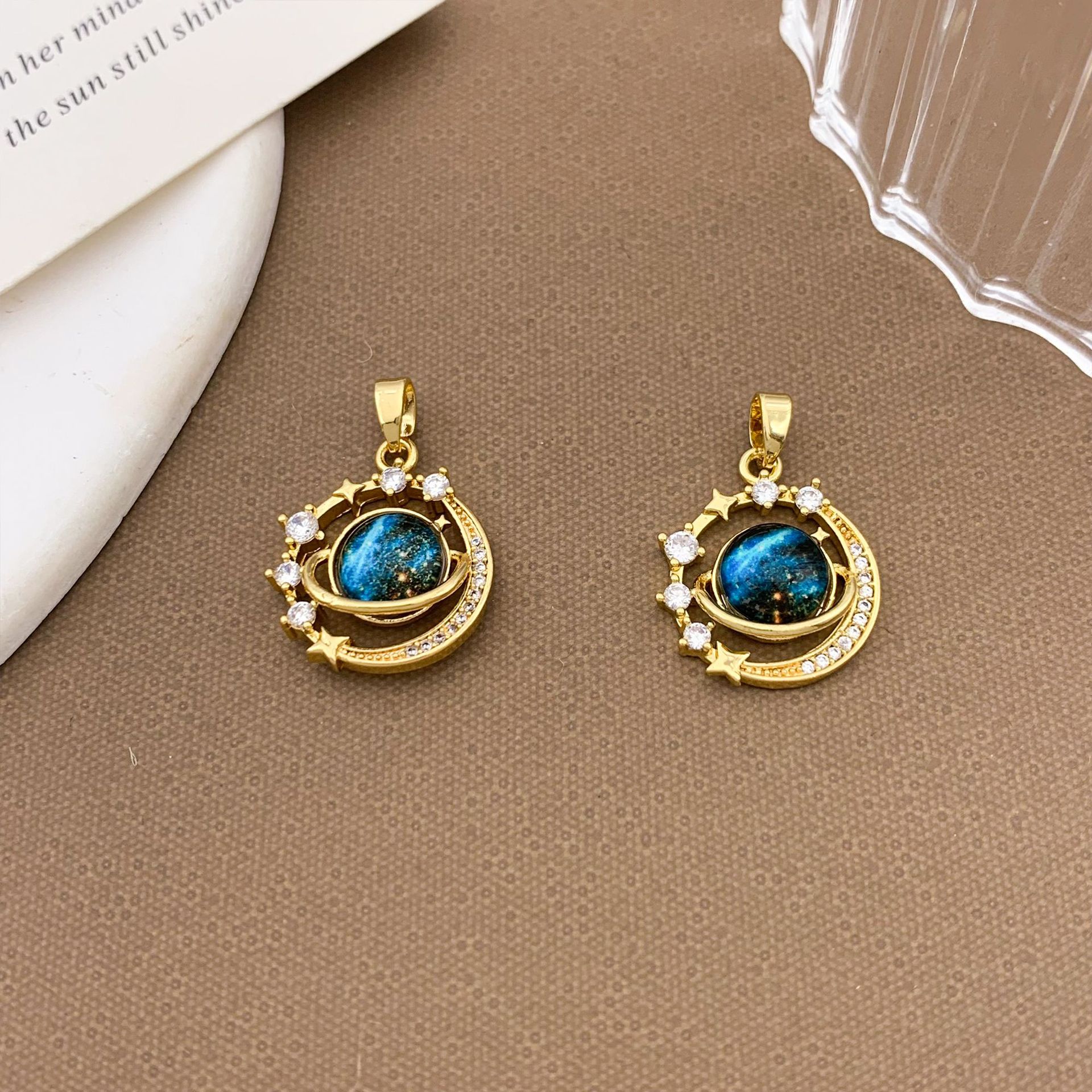 17:Xl1844 stars surrounding planet pendant gold trumpet