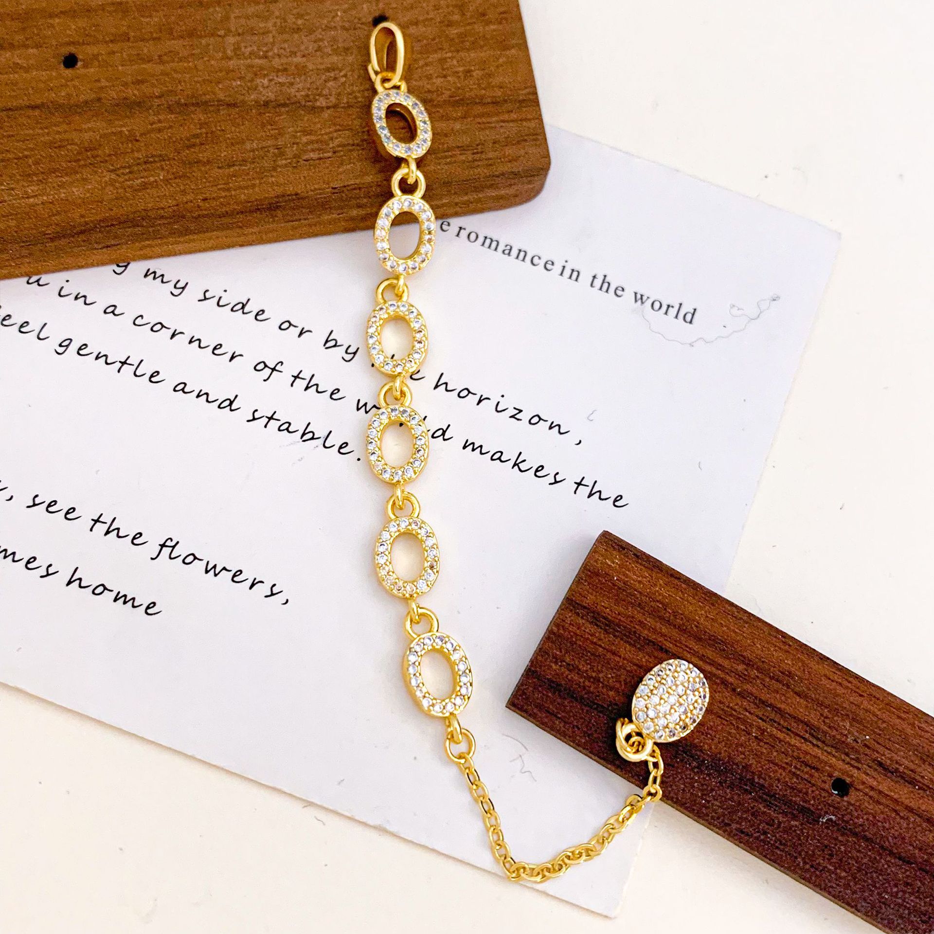 Xl5282 hollow oval tassel pendant gold