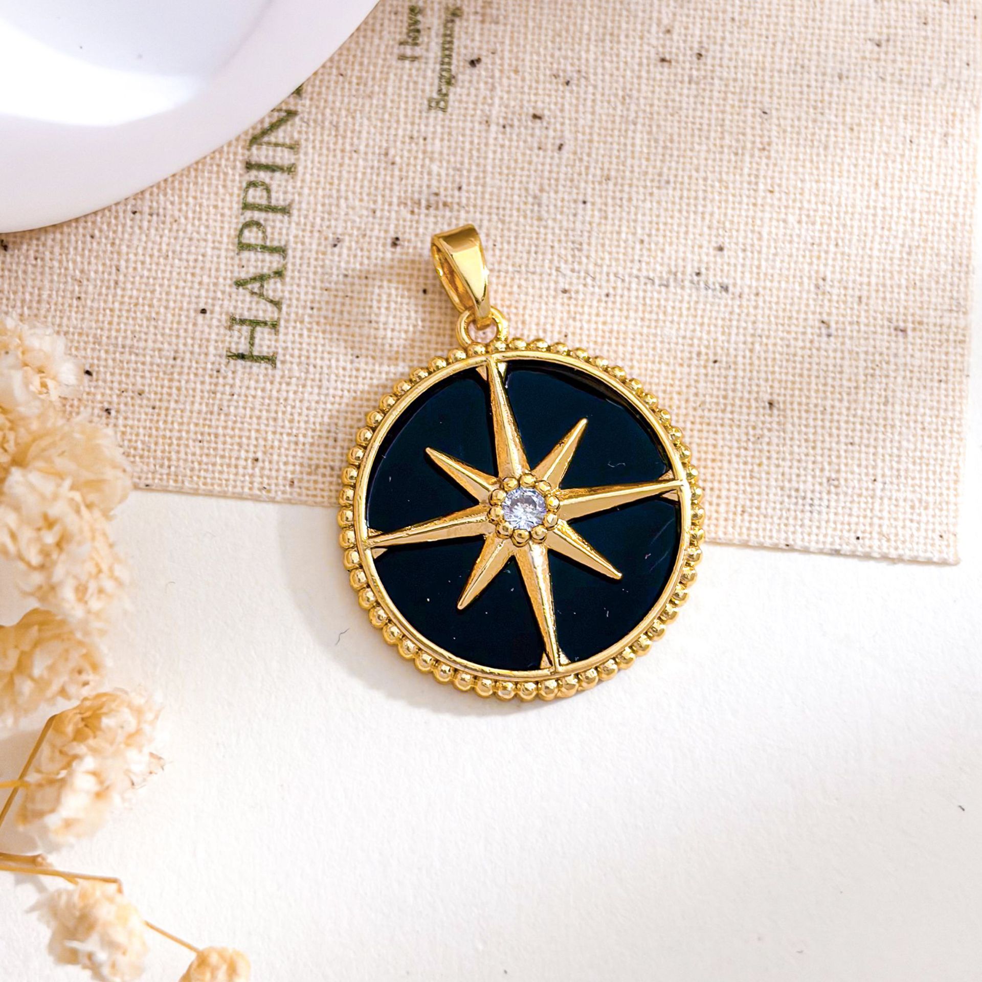 13:Xl5645 round eight-pointed star pendant gold black