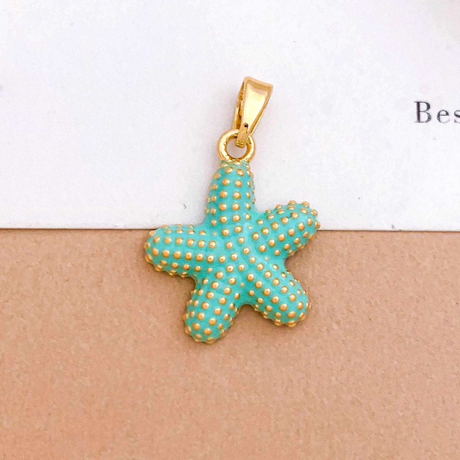 Xl4631 fat starfish pendant gold light blue