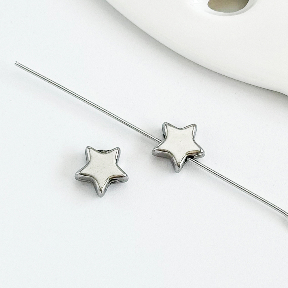 1:Steel color five-pointed star 7x8mm