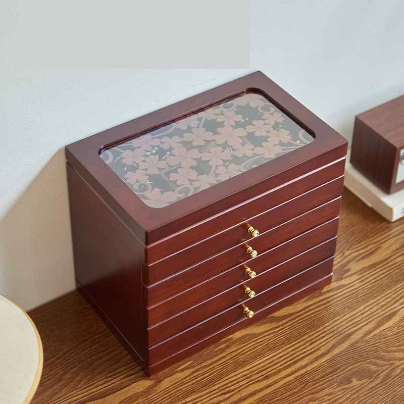 Five-drawer, six-tier, carved walnut finish
