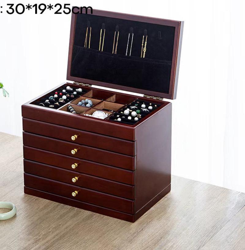 Five-drawer, six-tier carved [hook-style] walnut finish