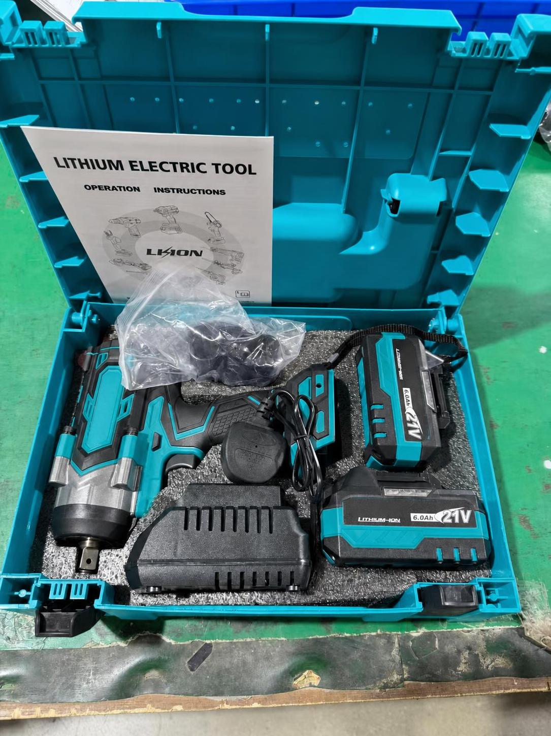 power wrench with two batteries and one charger