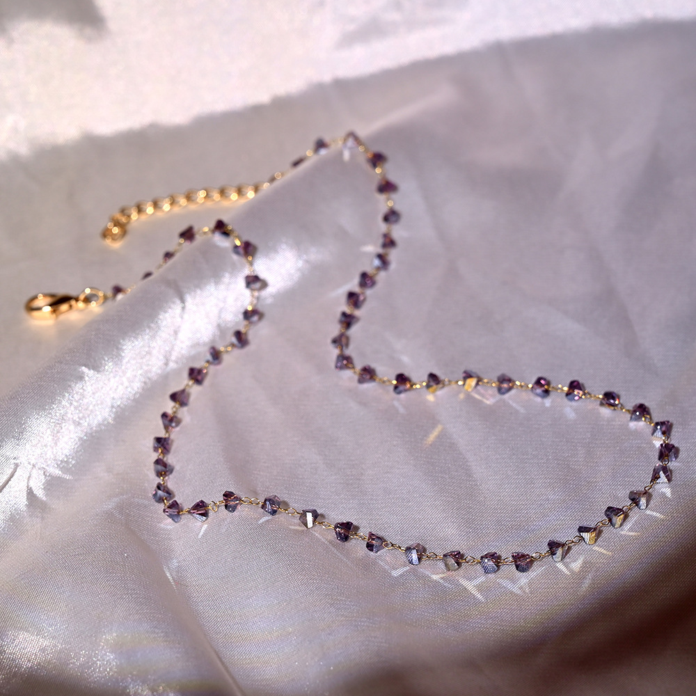 7:7-purple in gold chain