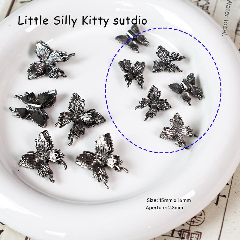 11:3pcs small gun black butterflies