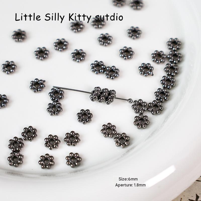 12:10pcs gun black snowflake spacers