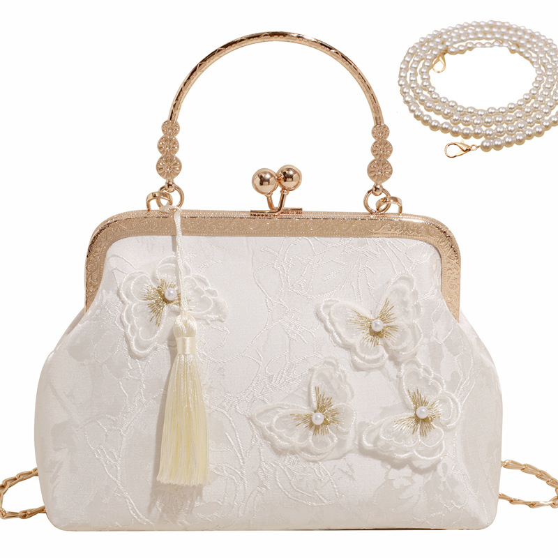 White butterfly with long pearl chain