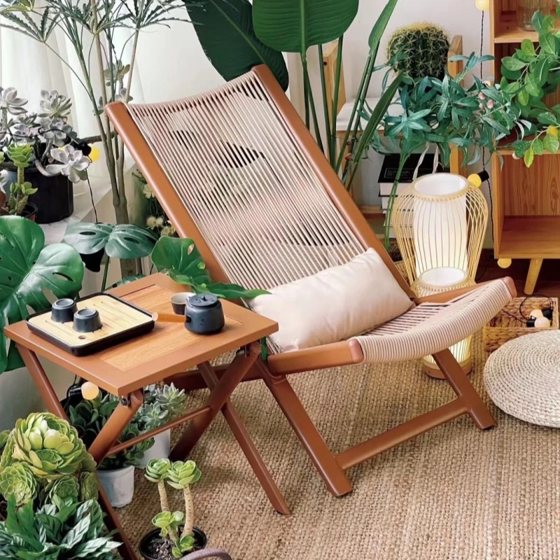 Lounger with cushion and side table