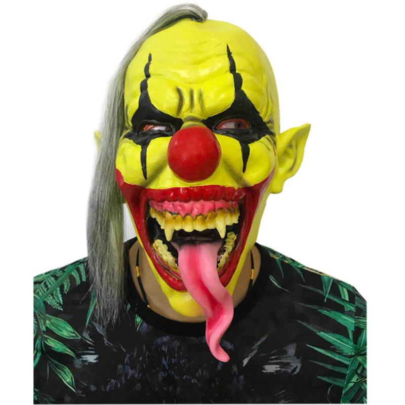 Yellow face clown sticking out tongue