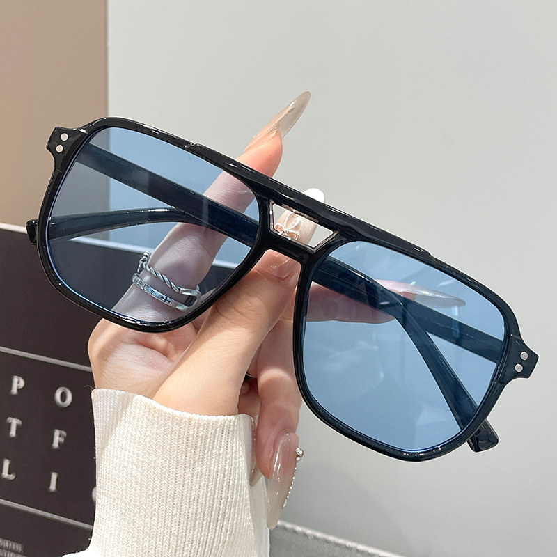 Black frame blue lens