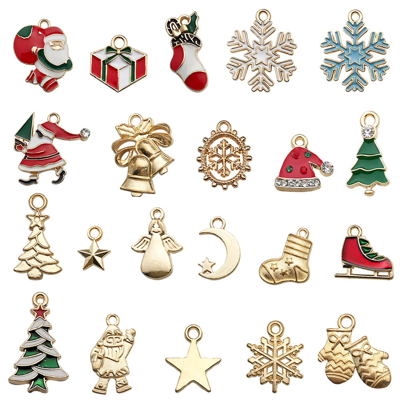49:Mixed 20 kc gold + enamel christmas ornaments - sn595