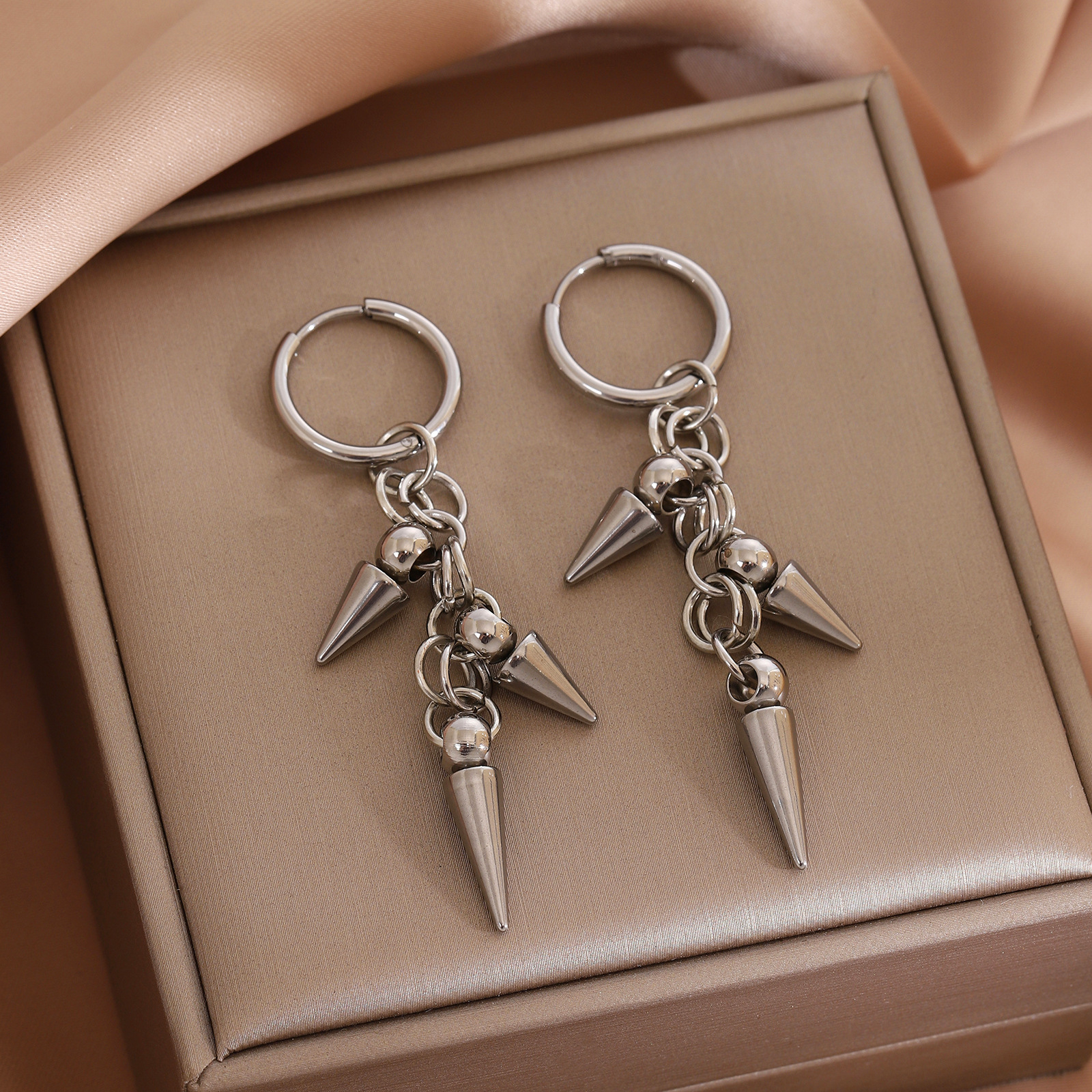 2:1 pair of rivet tassel earrings