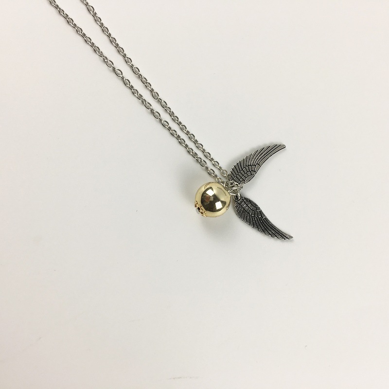 Gold spit necklace (random color)