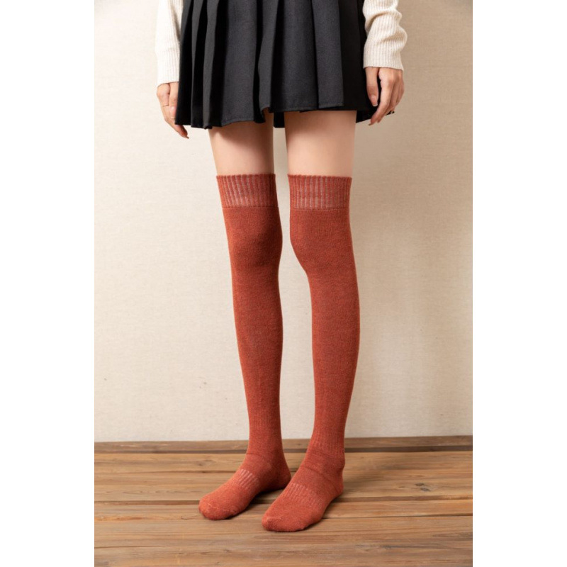 Over-the-knee socks in brick red