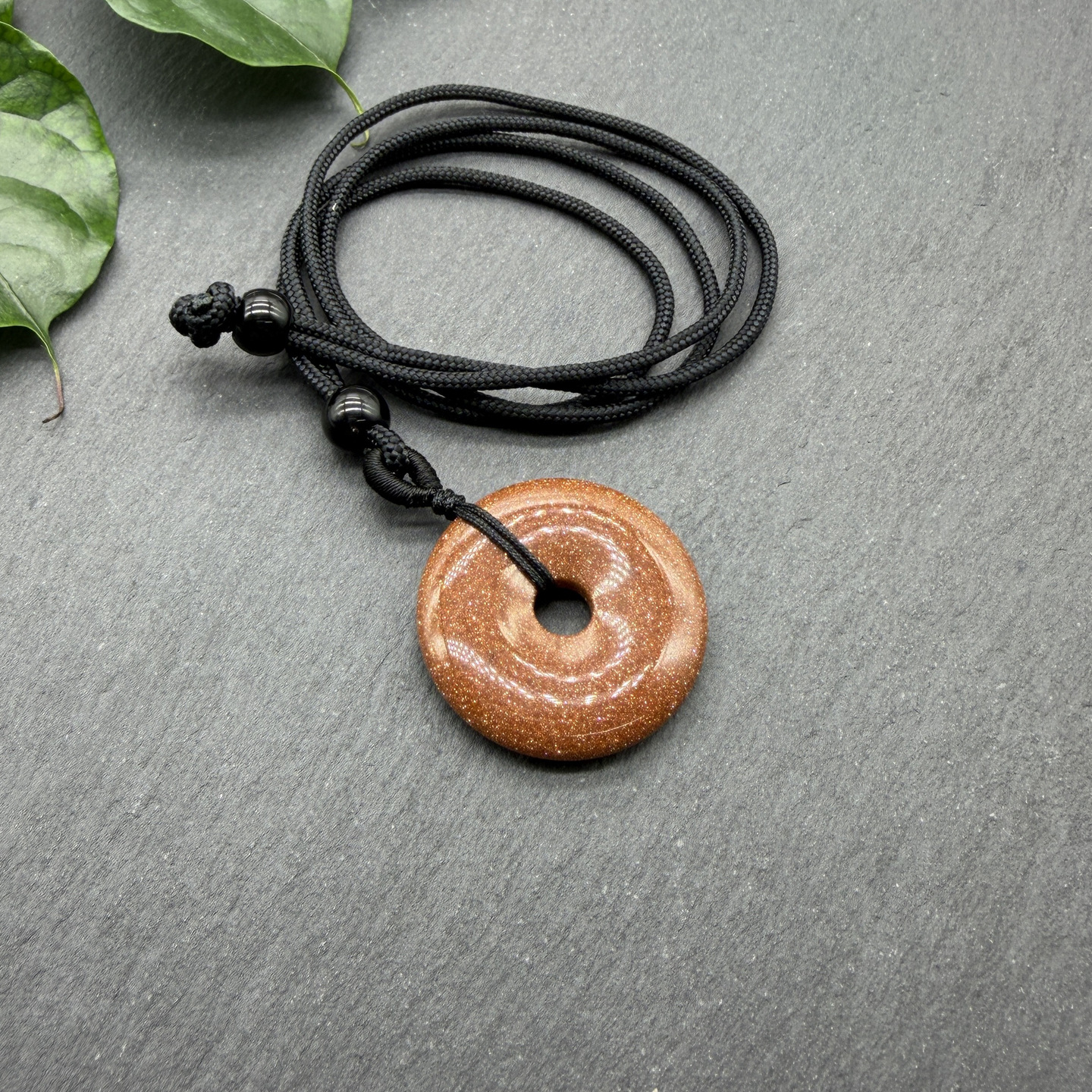 A piece of red gold sand 30mm