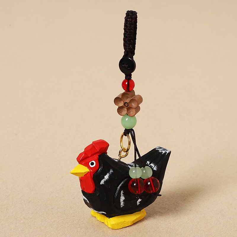 Wood-carved black chick - peach wood plum blossom