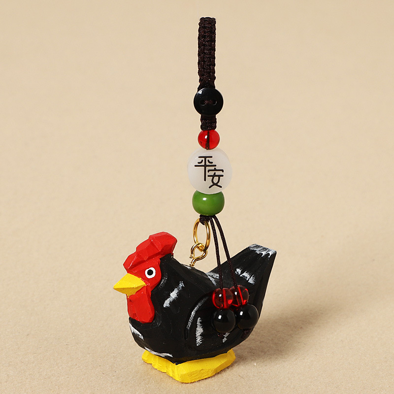Wood-carved black chick - Peaceful style