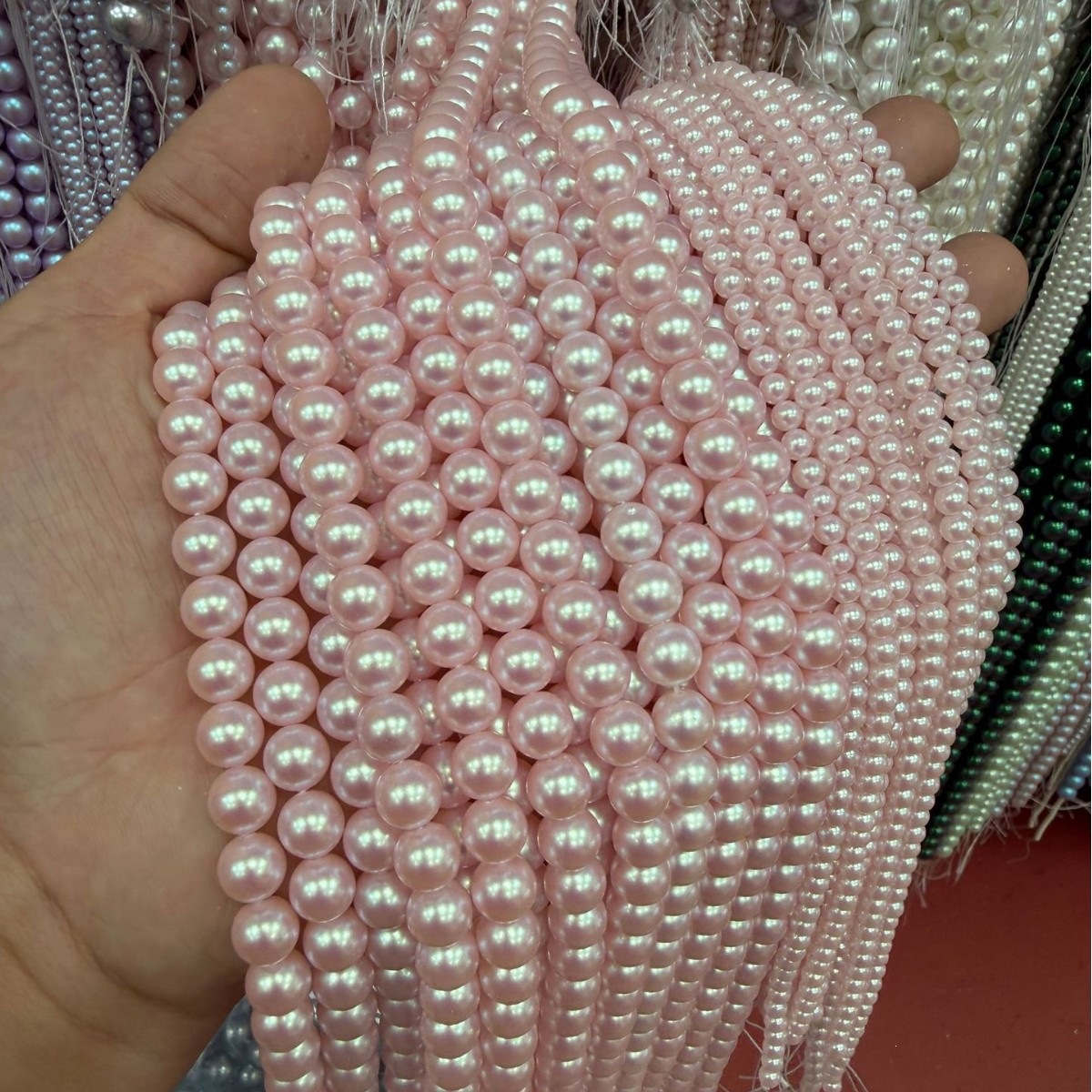 42:7A high-quality imitation Swarovski pearls (light pink)
