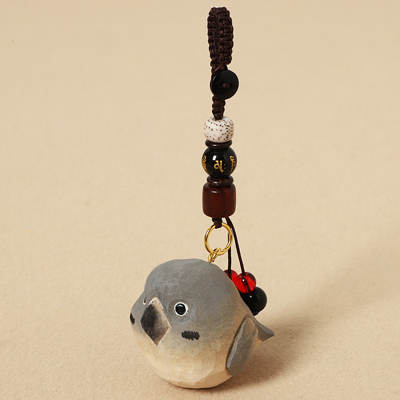 Wooden carved gray parrot - six-syllable mantra ed