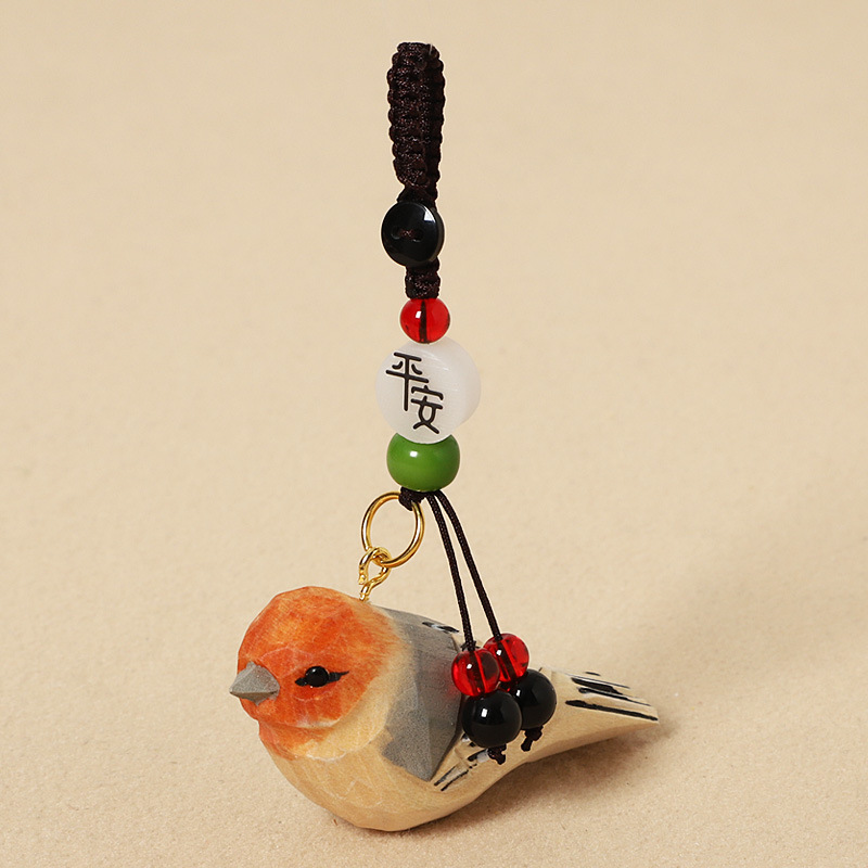 Wood carving orange-fronted tit-ping an model
