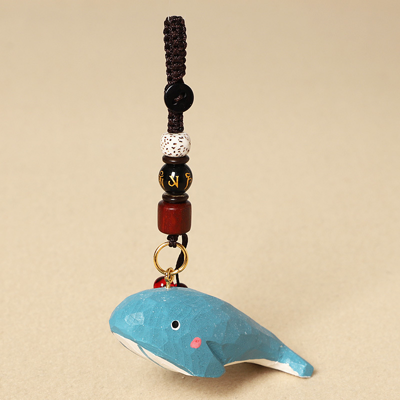 4:Wood carving of a whale-six-character mantra