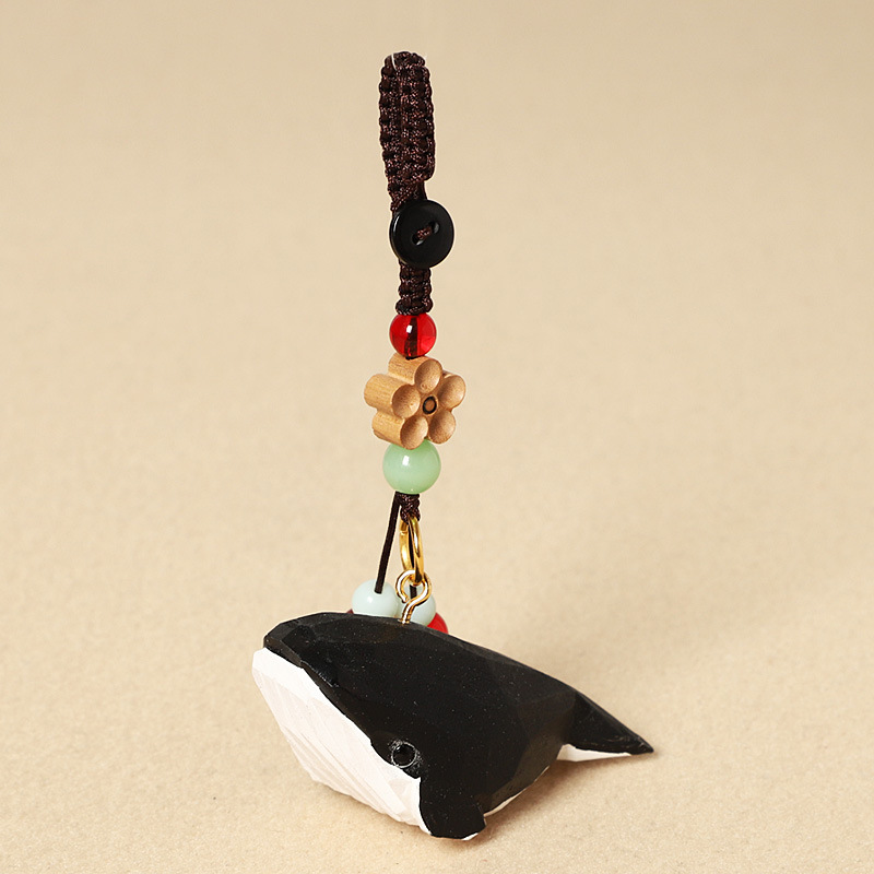 Wood carving striped black whale-peach wood plum b