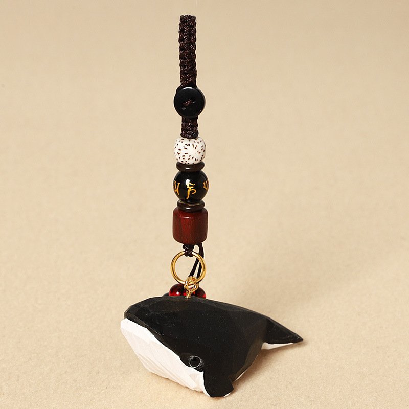Wood carving striped black whale-six-character man