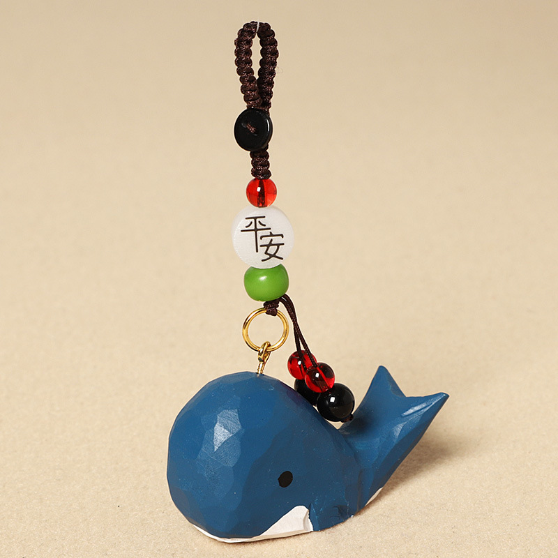 Wood carving blue whale-safe model