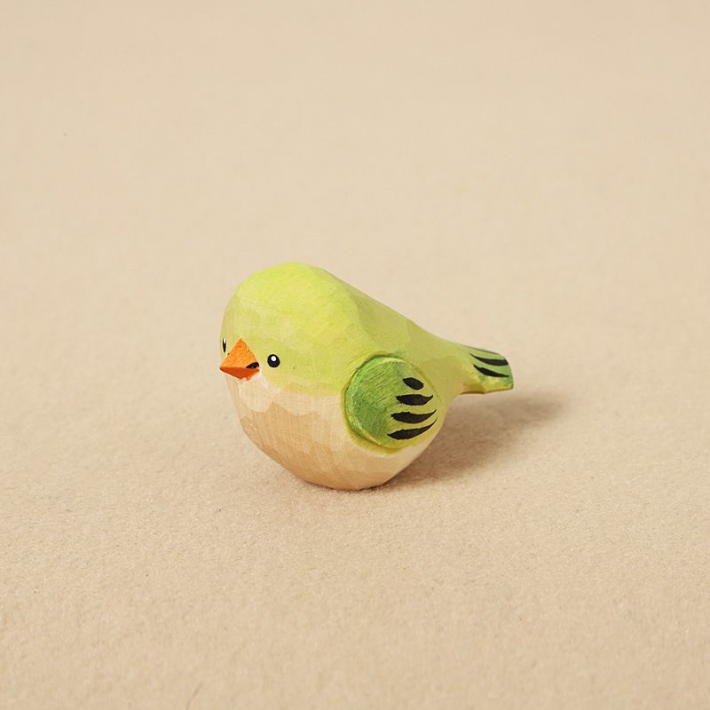 Wood-carved green little fat bird - decorative pie