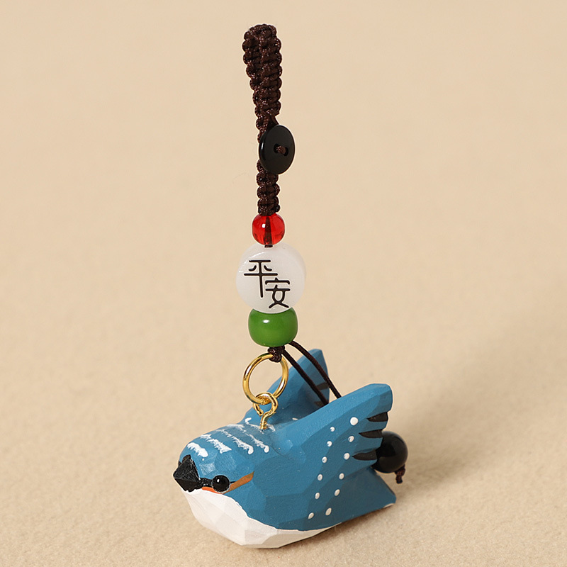 Wood-carved blue bird with wings - Peaceful style