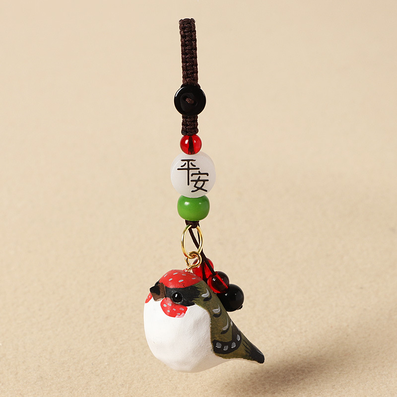 Wood carving red and green sparrow-safe style