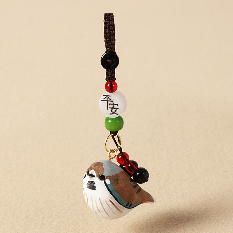 Wood carving brown and gray sparrow-safe style