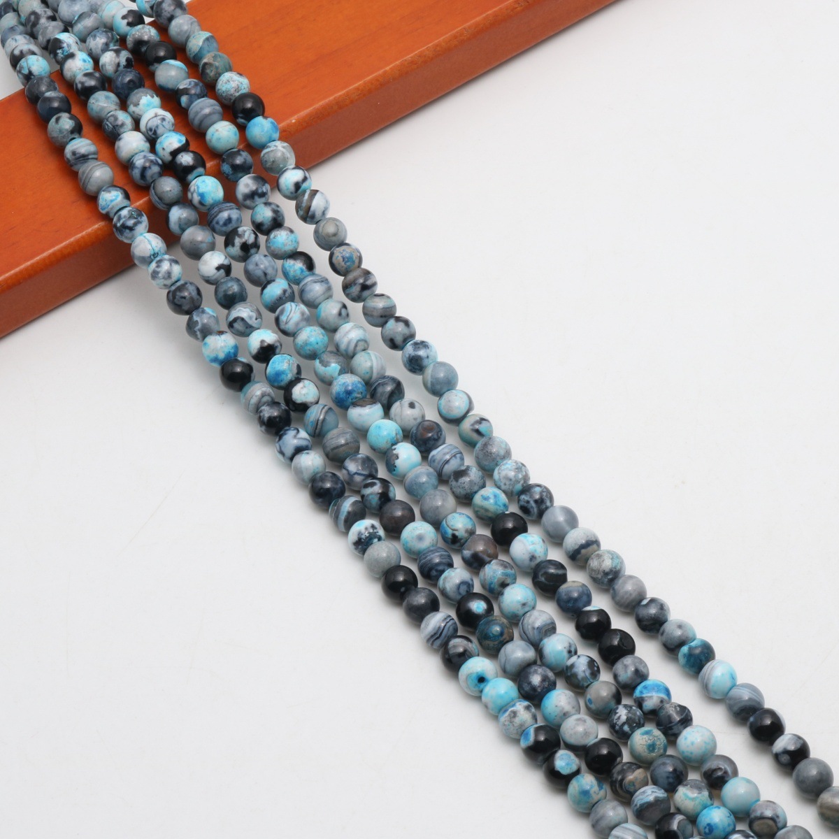 Sky blue black 6mm  (about 63 Pc/Strand)